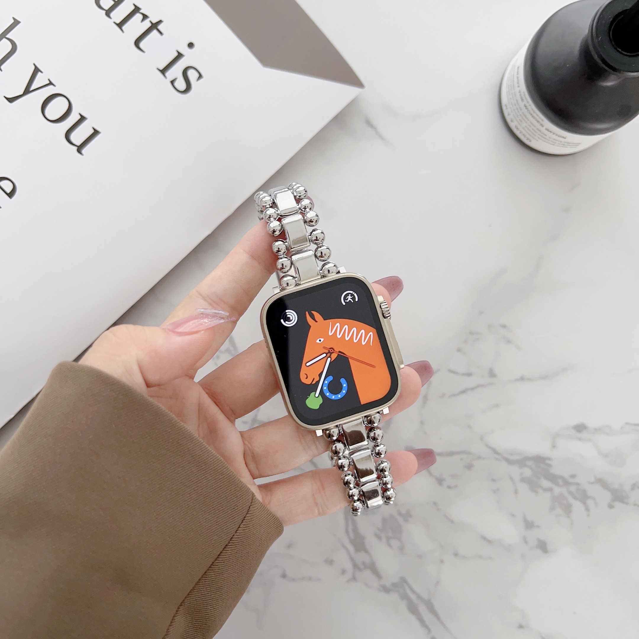 适用苹果iwatch圆珠金属手表带