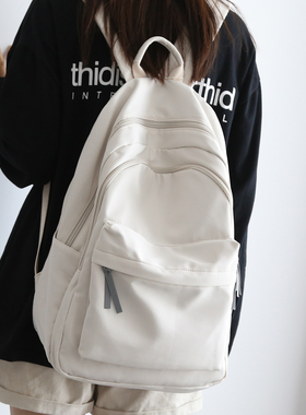 NR百搭纯色大容量背包男双肩包书包女初中生电脑包旅游双肩背包