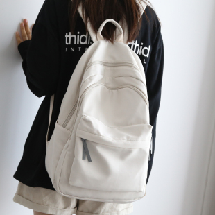 NR百搭纯色大容量背包男双肩包书包女初中生登山包双肩背包电脑包