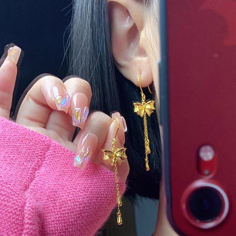 黄金色蝴蝶结耳环女新款时尚在逃