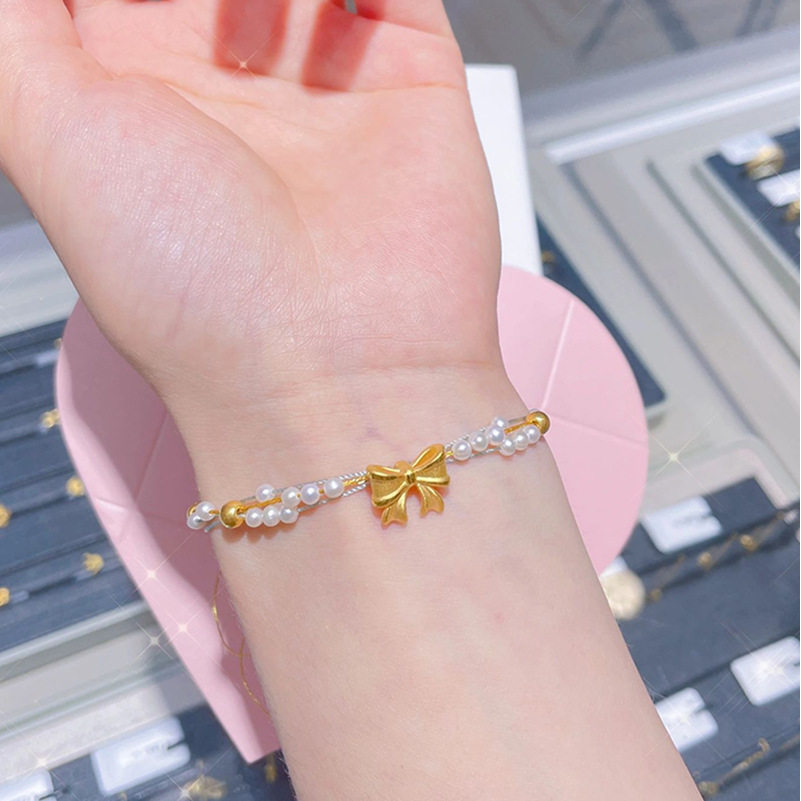 在逃公主金色蝴蝶结手链女珍珠编