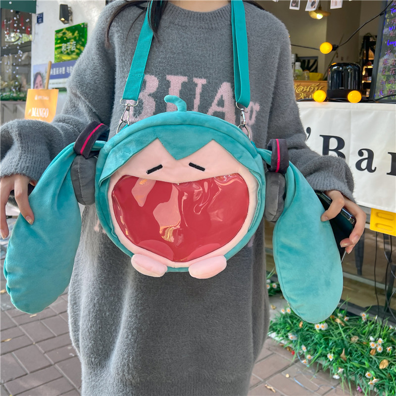 日式日系可爱少女二次元可爱小女孩斜挎包痛包玩偶背包学生书包透