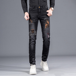 高端金牛刺绣潮牌牛仔裤男中国风弹力修身小脚印花长裤子春秋新款