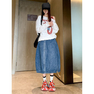 2026年高腰休闲蓝色A型花苞A字廓形感拉链牛仔半身裙女新款中长裙