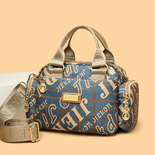 杰克丹妮新款高级感妈妈包耐磨小包大容量帆布包两用手提斜挎女包