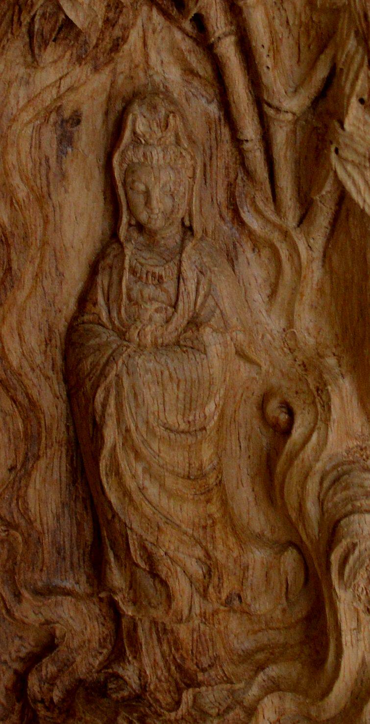 印尼加里曼丹老料木雕童子拜观音