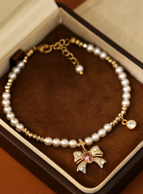 XKDDCT超仙粉色蝴蝶结锆石手链施