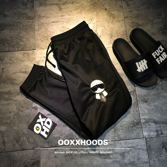 可爱时尚百搭风珠子pu皮运动长裤