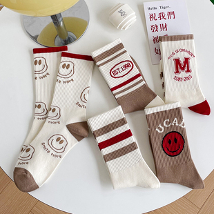 韩版网红学院风运动中筒袜长筒棉袜女袜笑脸条纹字母秋冬欧美潮袜