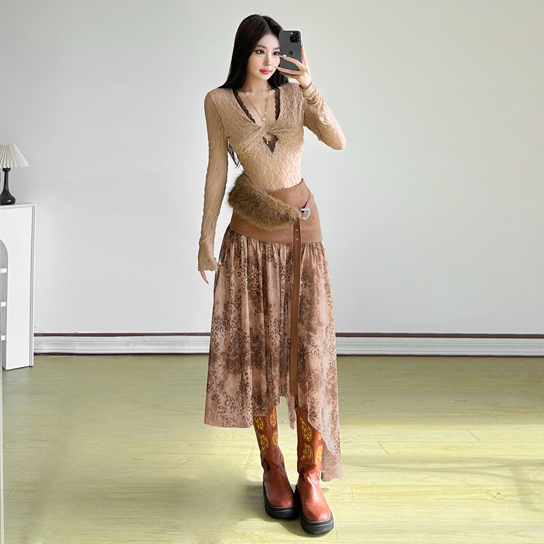 游牧风轻纱拼接不规则豹纹半身裙