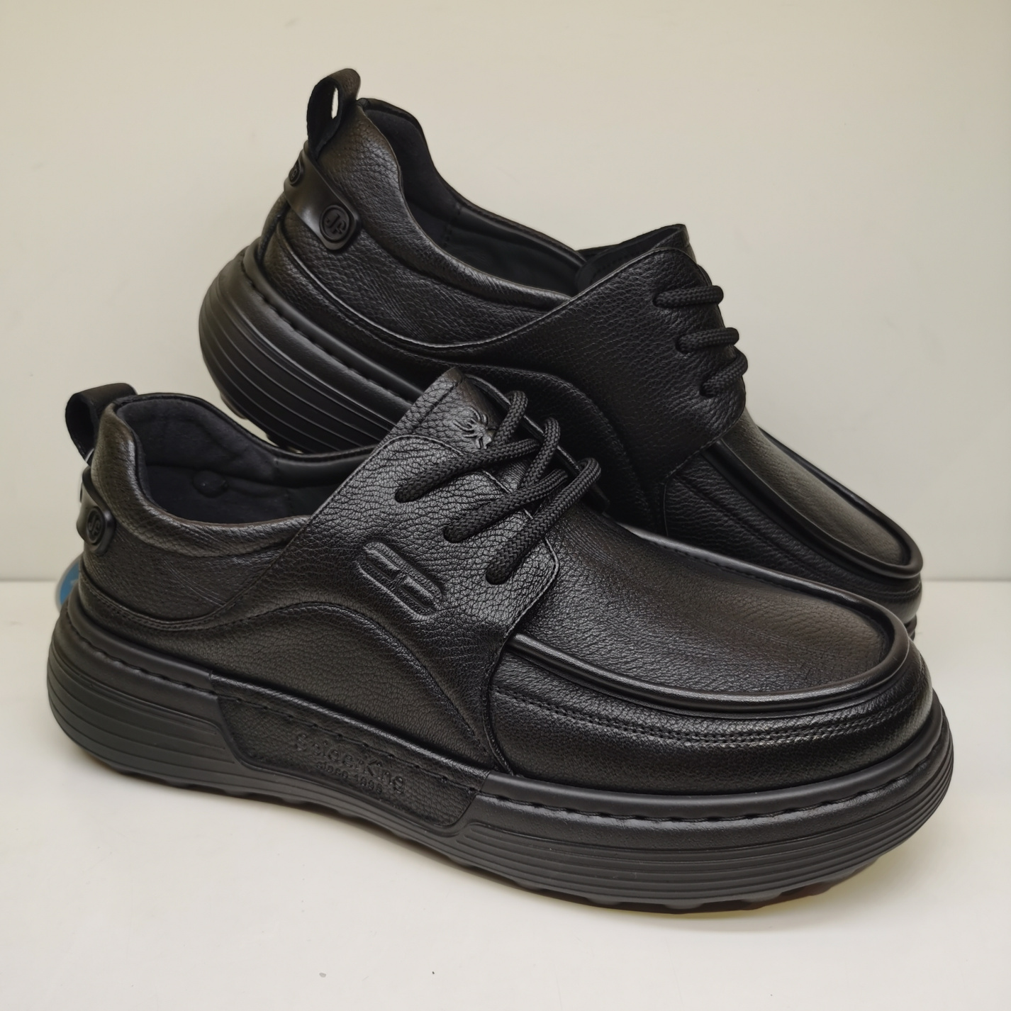 蜘蛛王男鞋2025新款时尚休闲鞋