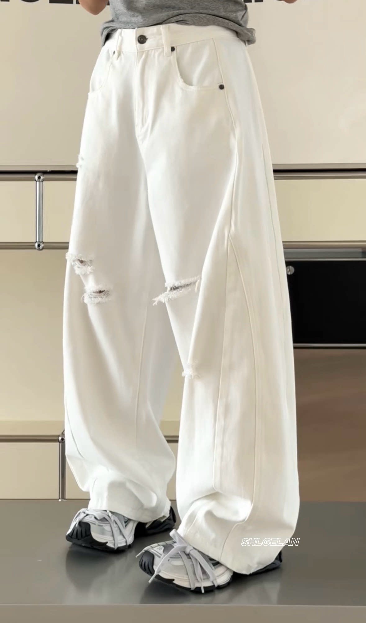 Z3659诗歌兰欧货牛仔裤2026春款女装 时尚气质破洞毛边白色牛仔裤