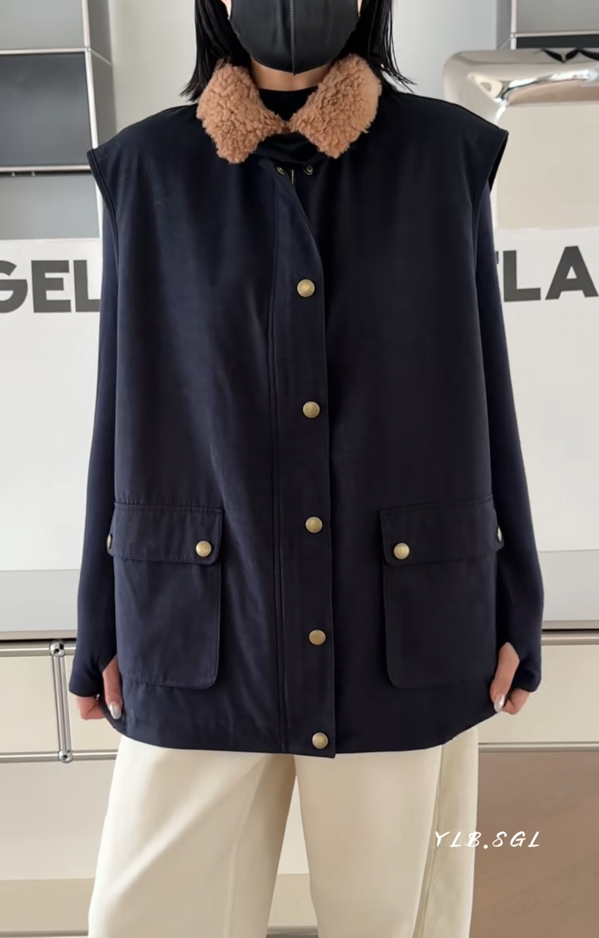 53556诗歌兰女装2025冬款 气质藏青蓝羊羔毛翻领工装风马夹棉外套