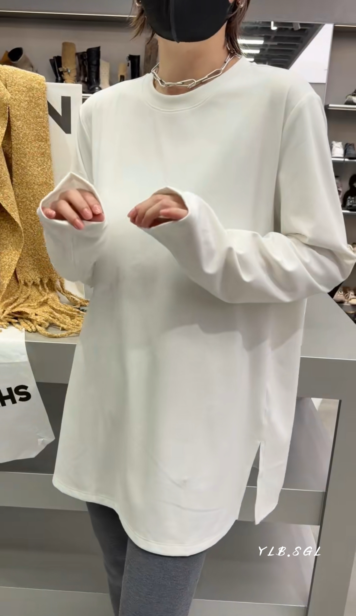 58585诗歌兰女装2025冬款 简约百搭圆领开衩打底衫磨毛白色T恤女