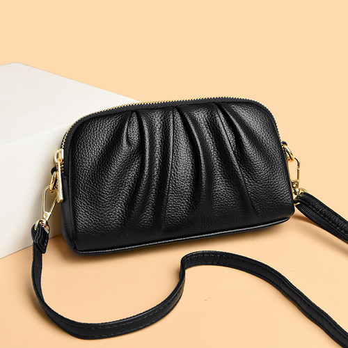 真皮手拿包女2025新款牛皮单肩包