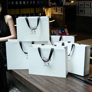 高档白色纸袋手提袋服装 衣服用购物袋子礼品袋 店打包袋定制女装