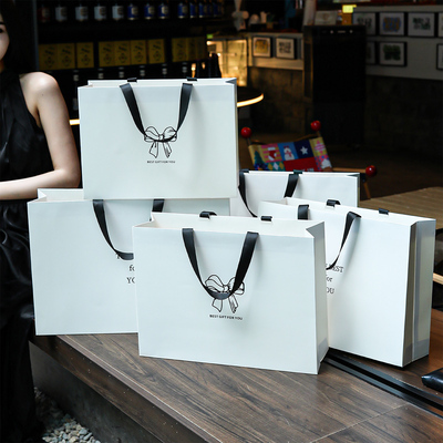 高级感白色纸袋手提袋服装店打包袋定制女装衣服用购物袋子礼品袋