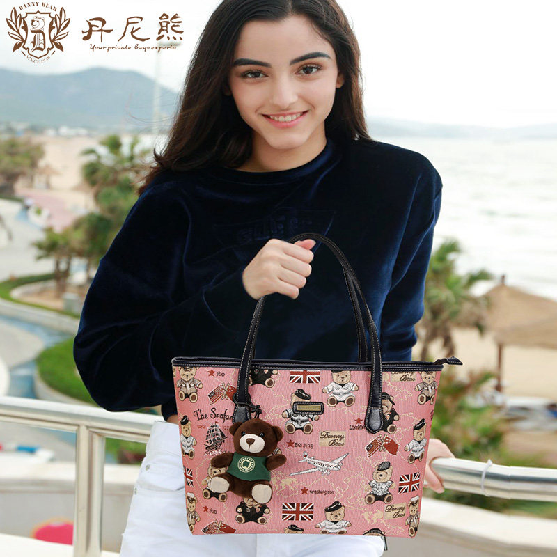 丹尼熊爱旅行新品单肩包袋女 手提休闲小熊布包航海熊DMB9115060