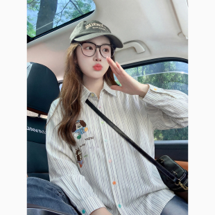 蓝色条纹衬衫女设计感小众2026早春新款卡通印花美式宽松上衣外套
