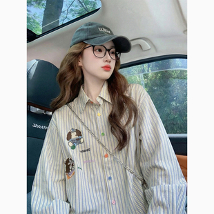 蓝色条纹衬衫女设计感小众2026早春新款卡通印花美式宽松上衣外套