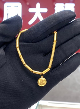 周大福传承圆形蛇形吊坠黄金手链