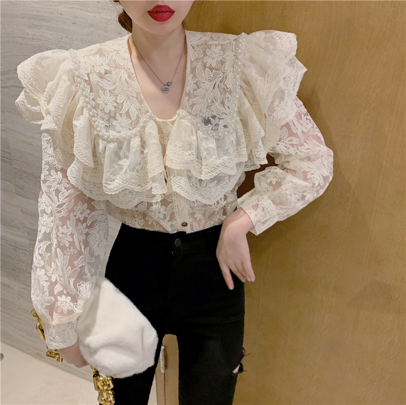 Real price heavy industry baby collar lace shirt women's 2021 spring new unique foreign style super fairy shirt