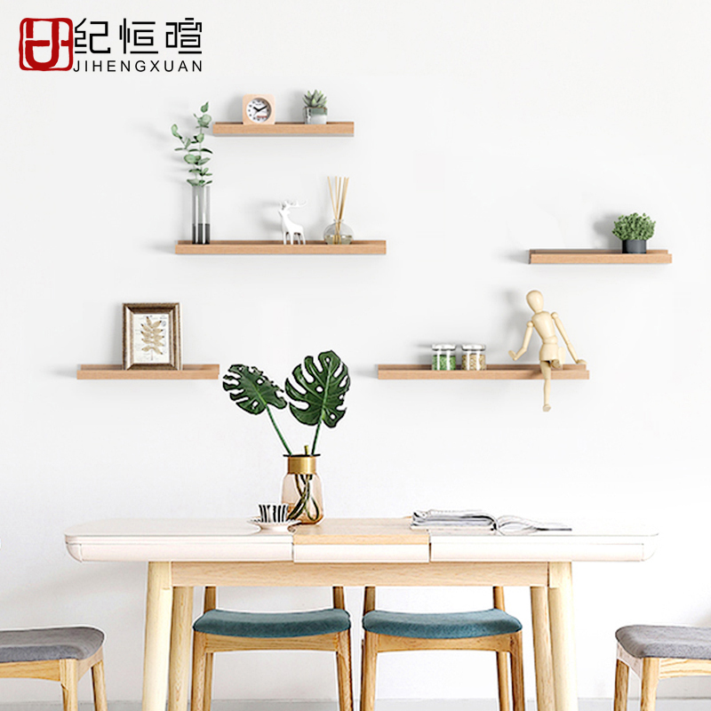 卧室墙上布置ins风吊板收纳架