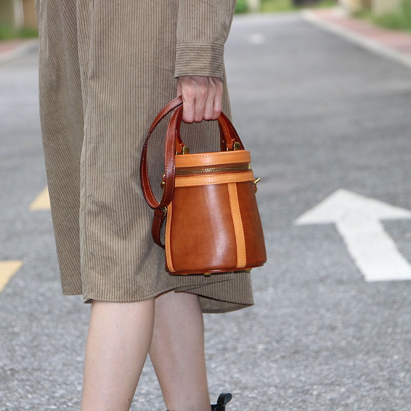 树膏牛皮女包撞色手工个性圆桶包高级感手拎包时尚百搭单肩斜挎包,箱包皮具/热销女包/男包,水桶包,淘宝优惠券,粉丝福利购,淘宝优惠卷