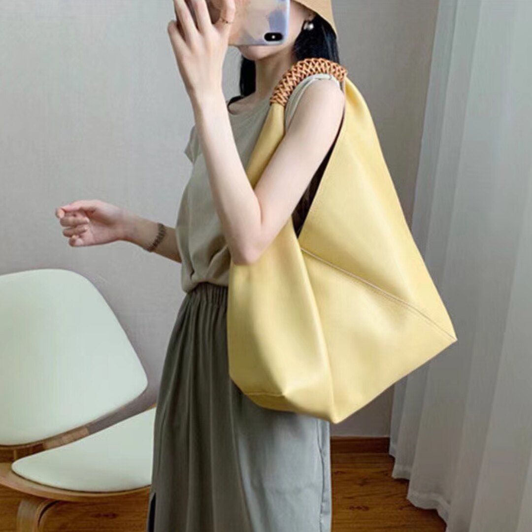 真皮大容量小众轻奢托特包水桶包包2026新款女通勤手提单肩高级感