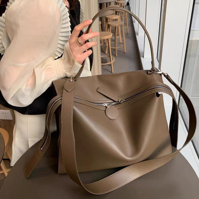 2025新款真皮小众轻奢托特包宽肩带通勤软皮包女大容量手提单肩包