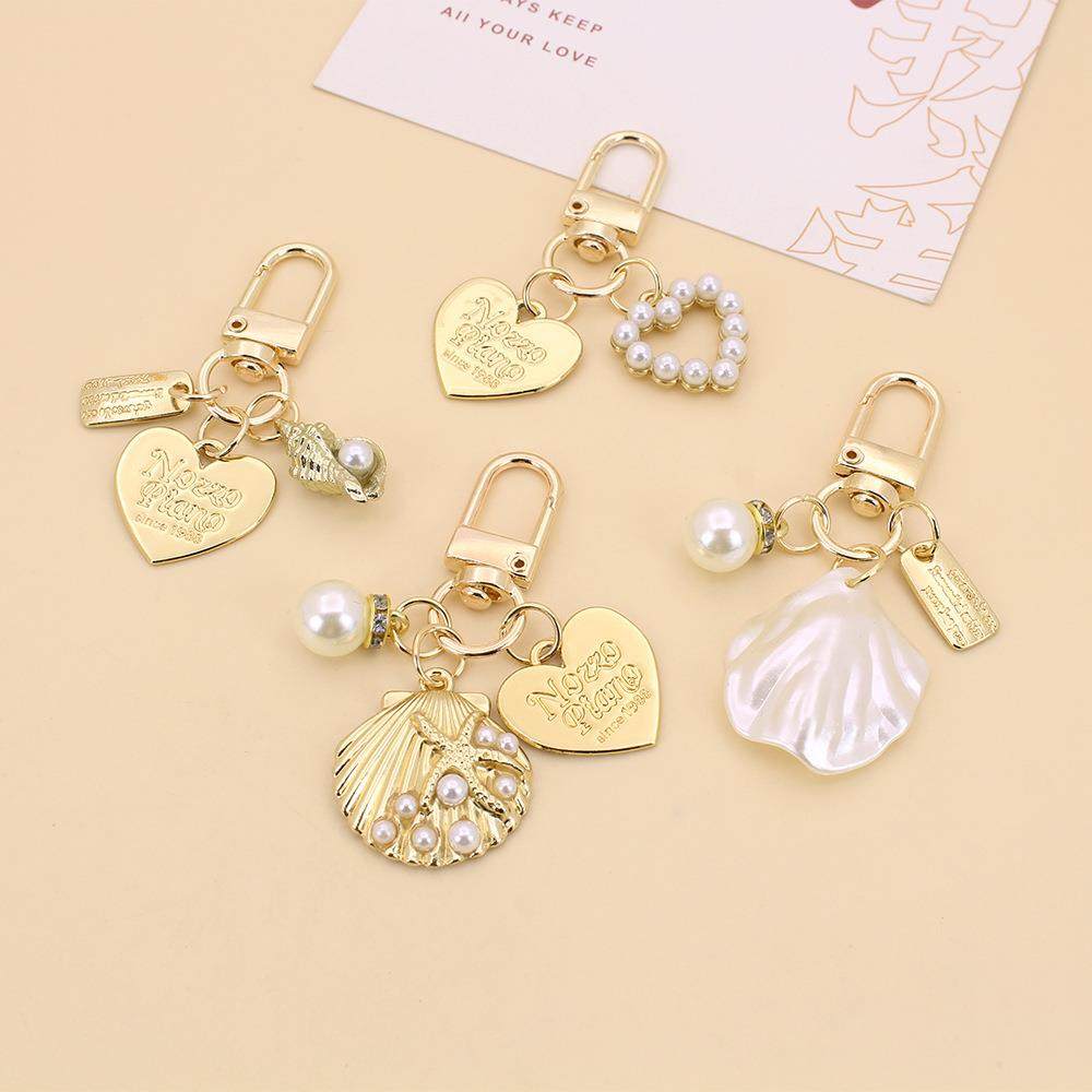 欧美时尚热销贝壳珍珠海螺钥匙扣创意百搭爱心片airpods门扣挂件,节庆用品/礼品,钥匙扣,淘宝优惠券,粉丝福利购,淘宝优惠卷