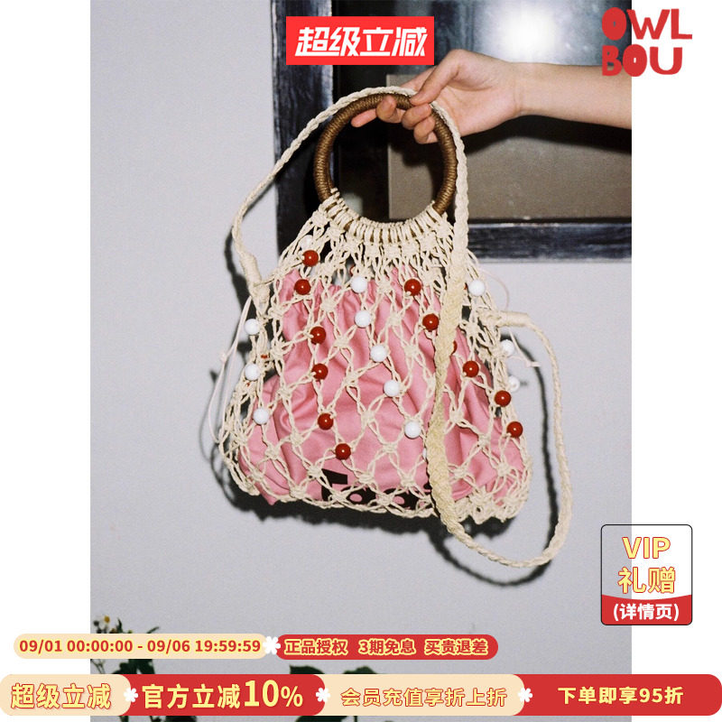 Tagi.圈圈果子编织手提包图片