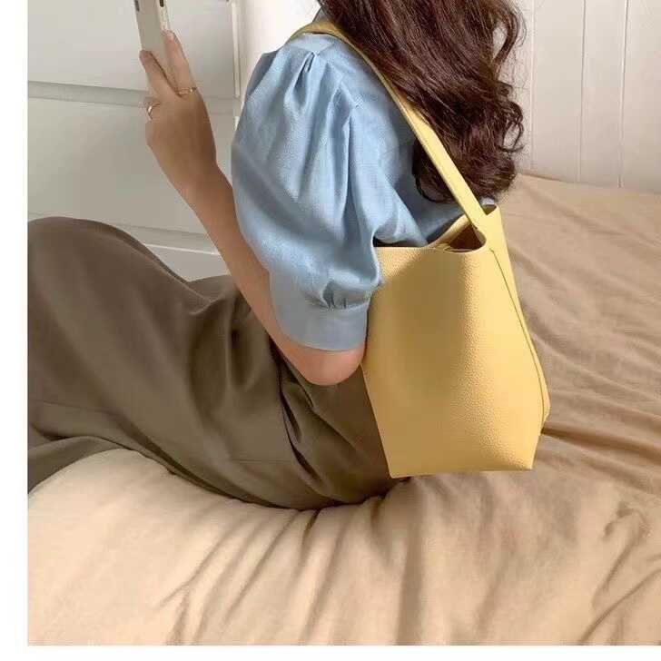 pu皮质立体腋下手提女包
