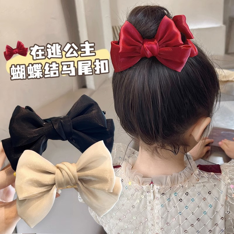 抓夹红色蝴蝶结高马尾丸子头图片