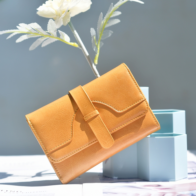 钱包新款2025爆款黄色招财真皮女短款时尚三折复古女士卡包一体包