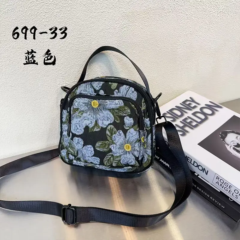 潮流女包新款牛津布印花斜挎包小包实用多隔层大容量单肩可爱挎包