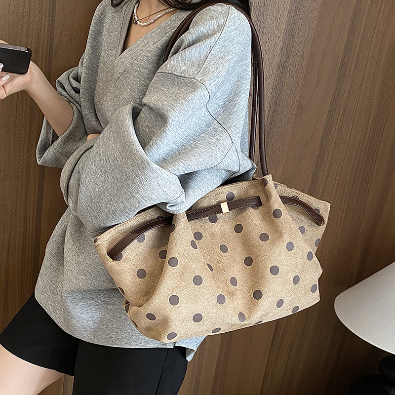 秋款波点翅膀大容量手提斜挎女包