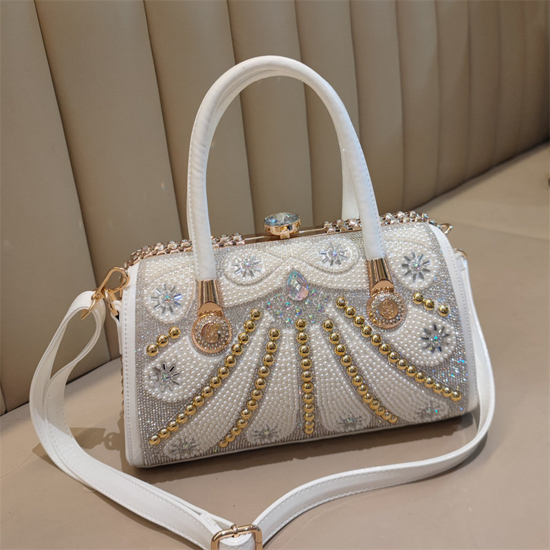 高级感轻奢珍珠包包女2026新款镶钻时尚气质休闲真皮手提单肩斜挎
