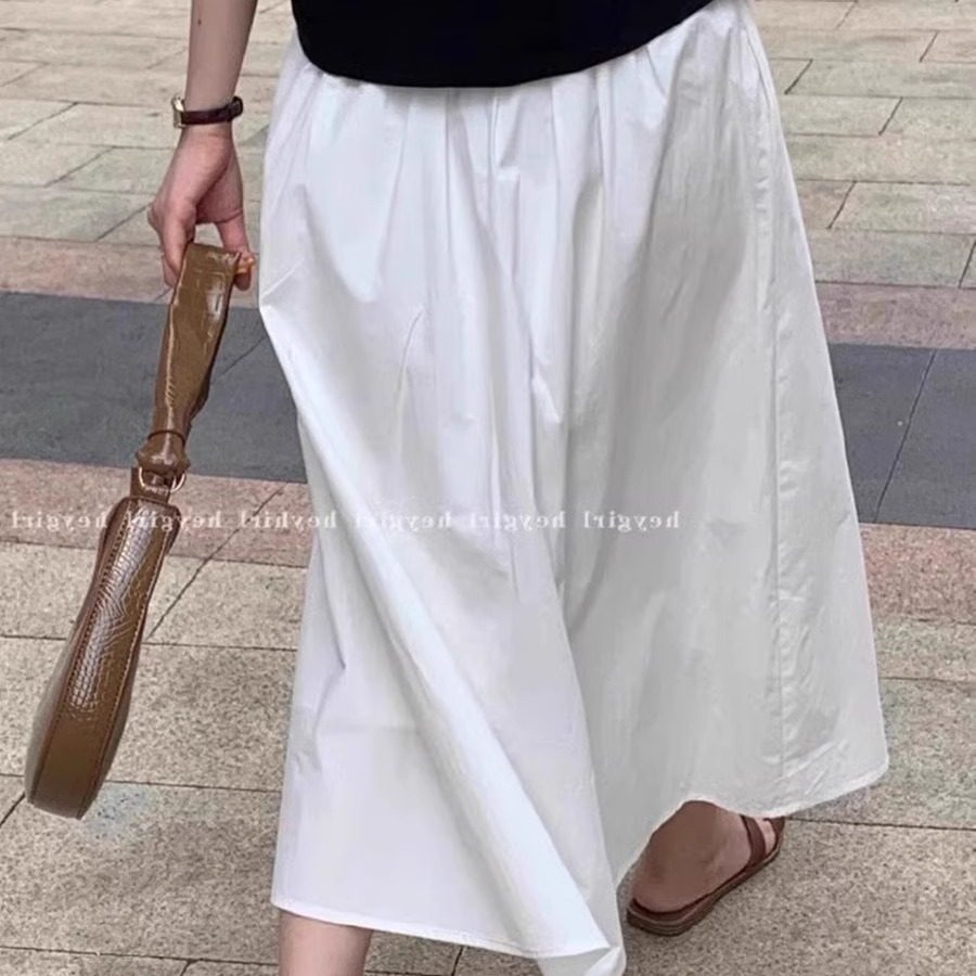 气质港风显瘦设计感白色A字半身裙2026春夏中长款纯棉高腰伞裙女