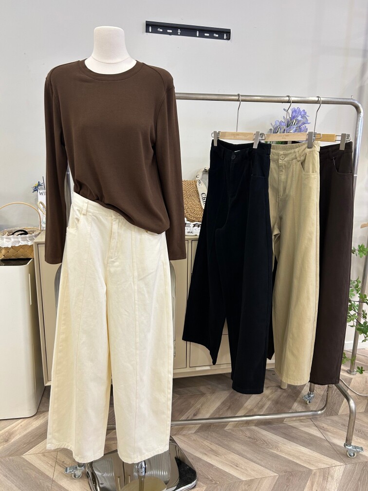 俏安朵2026秋冬新款女士牛仔休闲裤全棉弯刀裤显瘦时尚长裤7068