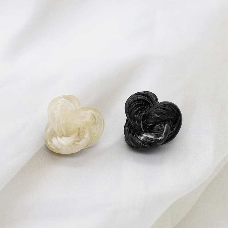 启铭异形仿打结树脂金属脚纽扣