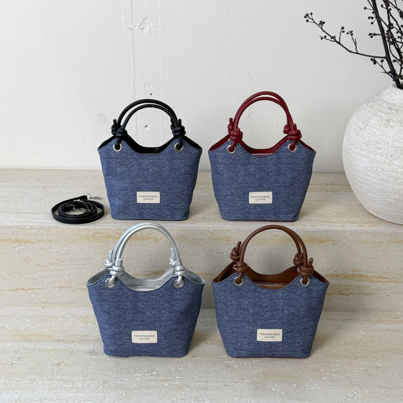 高级感洋气手提水桶包女2025新款时尚休闲单肩包大容量通勤斜挎包