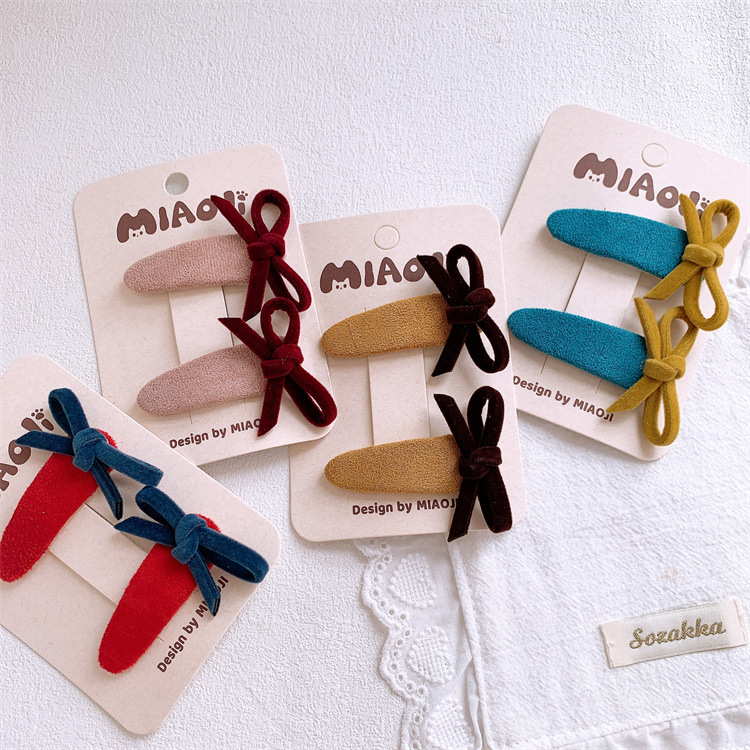 秋冬新款儿童镂空交叉蝴蝶结绒布发夹女童侧边刘海夹碎发BB夹发卡