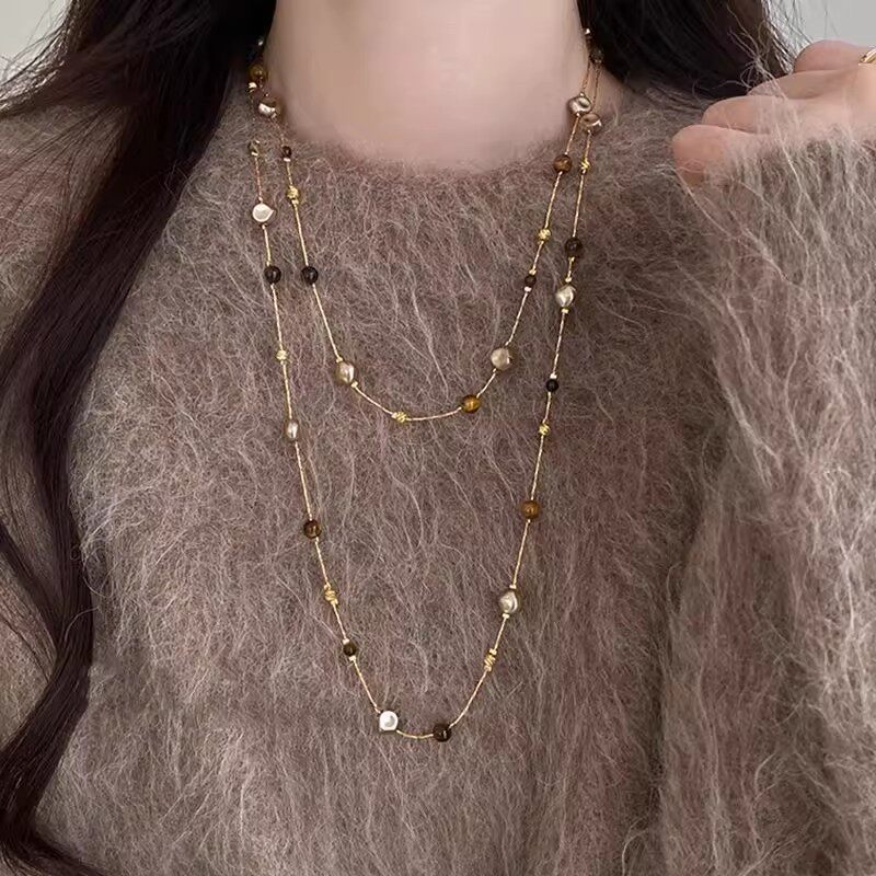 美拉德虎眼石珍珠项链女秋冬季2025爆款百搭轻奢高级感长款毛衣链