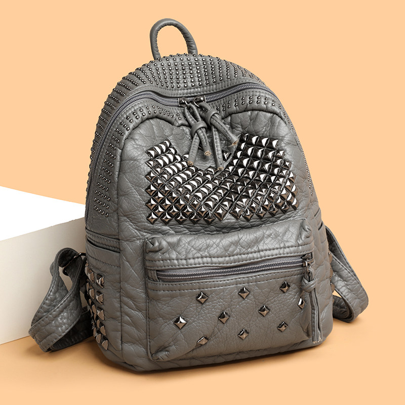 潮牌背包新款女包韩版百搭大容量休闲时尚pu皮潮流铆钉双肩包朋克