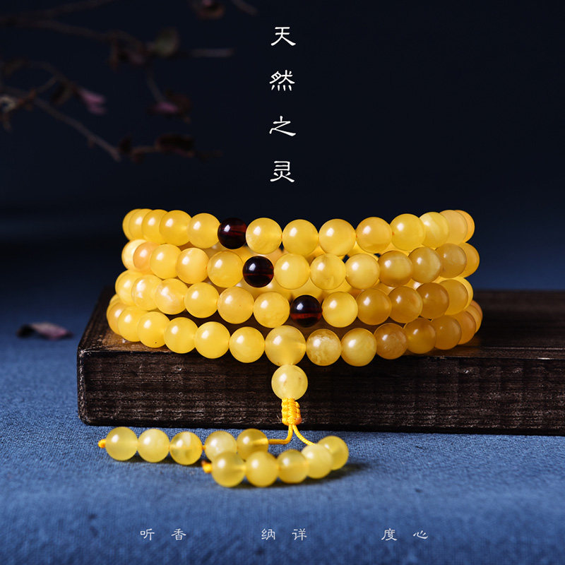 欧采妮 蜜蜡手串男士天然无烤鸡油黄琥珀108颗佛珠圆珠手链女款属于什么档次？