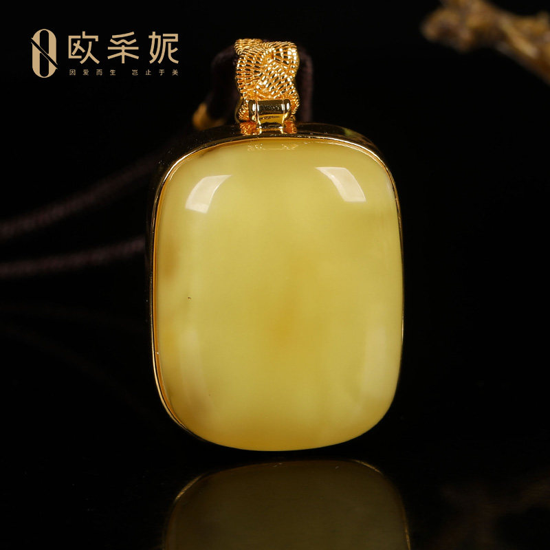欧采妮原石带皮银镶白花蜜蜡吊坠