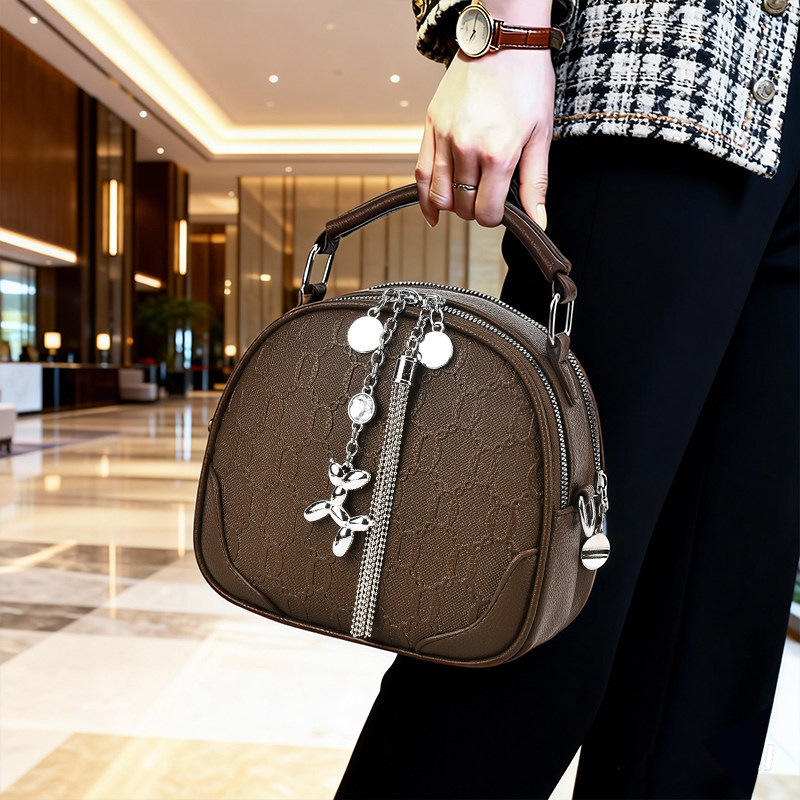 时尚压花纹理小圆包手提单肩斜挎