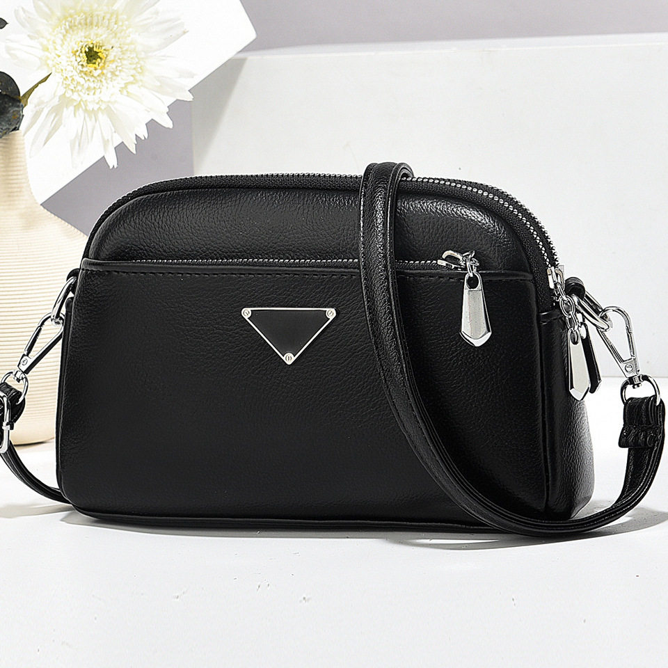 2025新款女士黑色皮质单肩斜挎包小包百搭多拉链牛津布时尚潮流