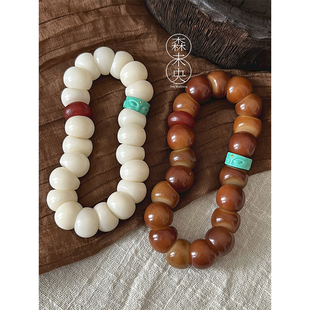 森未央「琥珀半面佛」14mm山竹蒜瓣大肠菩提根手串+菱镁矿半面佛